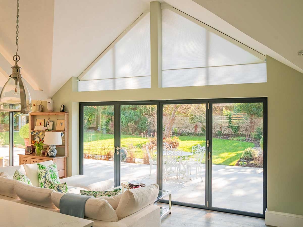 Our Pure™ Aspect blinds fitted in a conservatory with an asymmetrical gable.