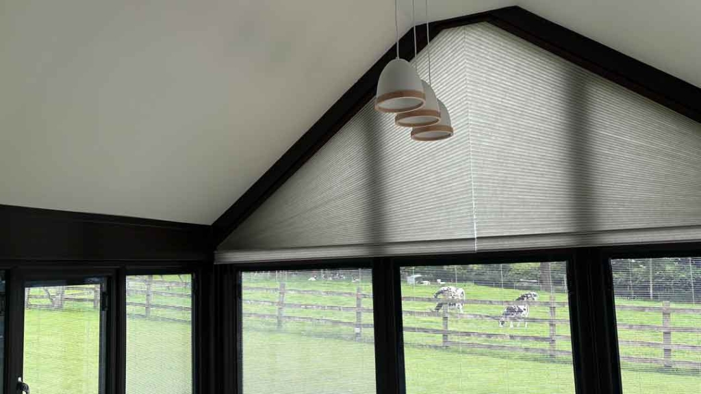 Sleek Duette Blinds on these Trapezoid Windows in and English Country Home