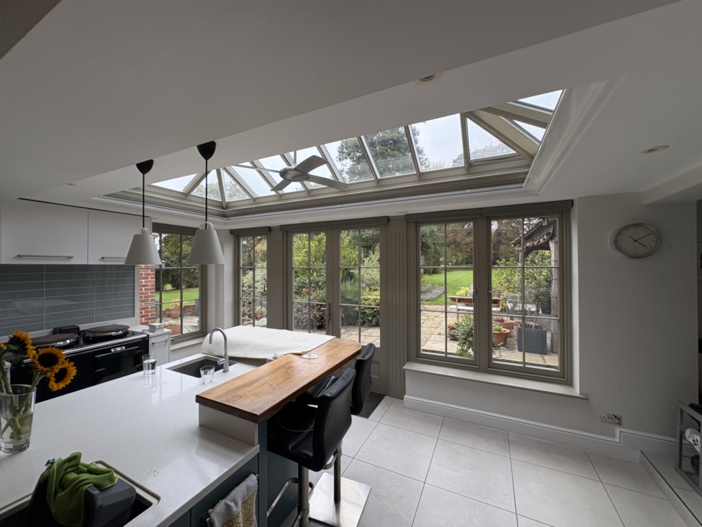 Well lit kitchen with roof lantern blind