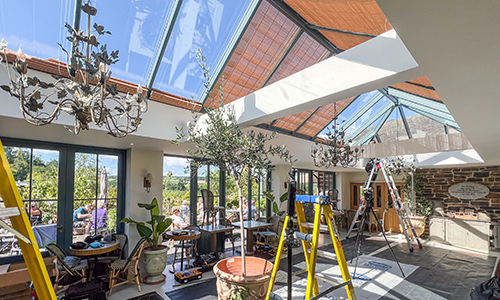 House interior with large brown roof lantern blinds